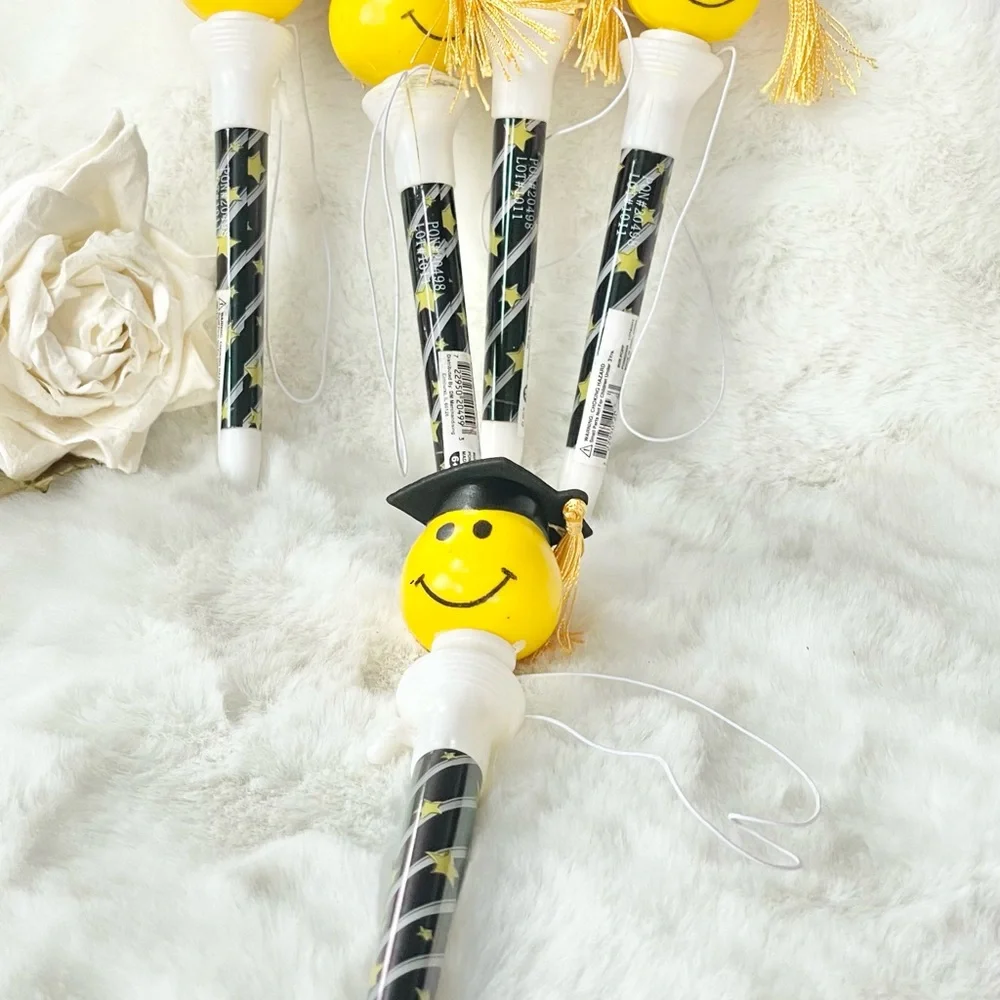 New with tags SPRING LOADED GRADUATION POP OFFS Set of 5. GRAD CAP with TASSEL